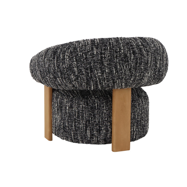 Nature – Black Fabric Armchair with Oak Legs side angle highlighting rounded form and textured black-and-white woven fabric with natural oak legs