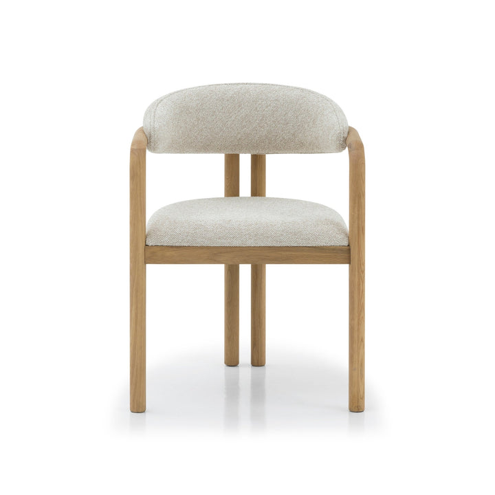 Handcrafted oak hardwood chair with organic lines and premium fabric upholstery