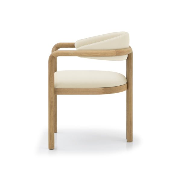 Nature Oak Dining Chair pure side profile showing curved backrest, beige leather seat depth, and front and rear legs