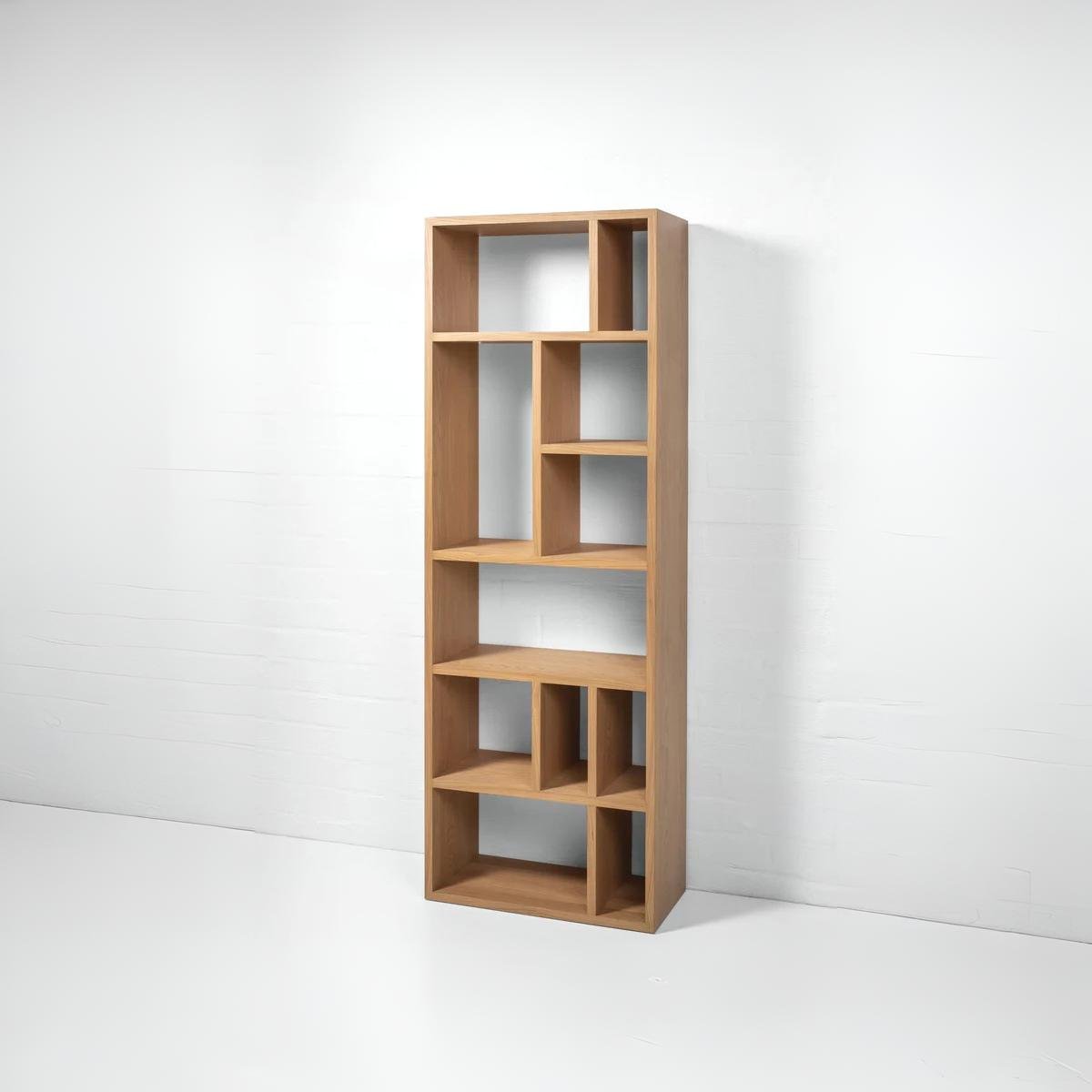 Modern oak bookcase with open compartments for books and décor storage