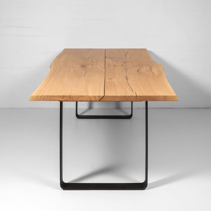 Oaken Dining Table – Handcrafted Solid Oak Hardwood with natural edge and slim black metal legs in minimalist Scandinavian style, file KH_6015.jpg