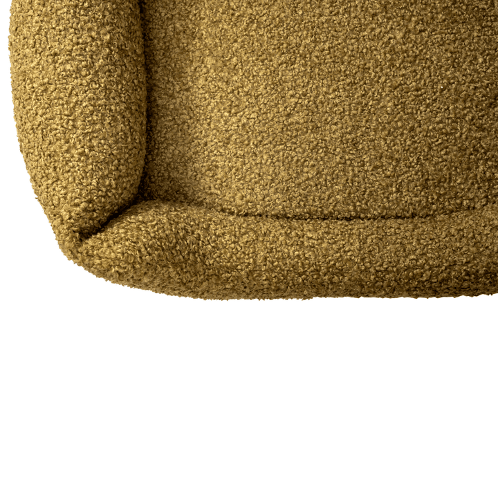 Top-down view of a durable and plush dog bed with raised bolsters, designed for orthopedic support