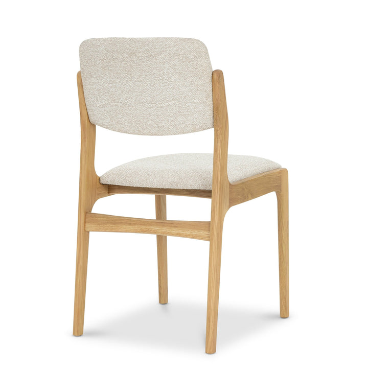 Oslo Dining Chair - Cobble 110 Fabric with light beige upholstery and natural solid oak frame, side view