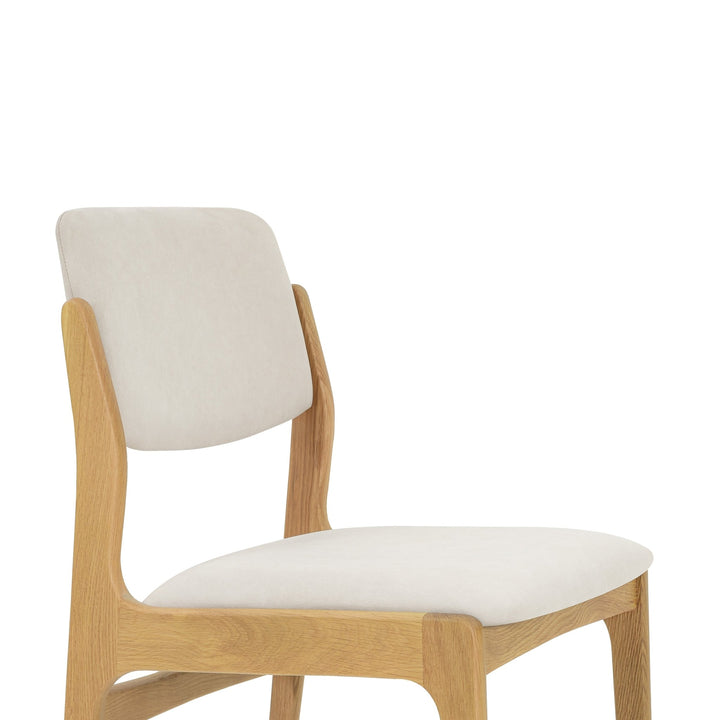 Oslo Dining Chair - Riley fabric with light natural oak frame, cushioned backrest and seat, minimalist Scandinavian solid wood design, gallery position 1.