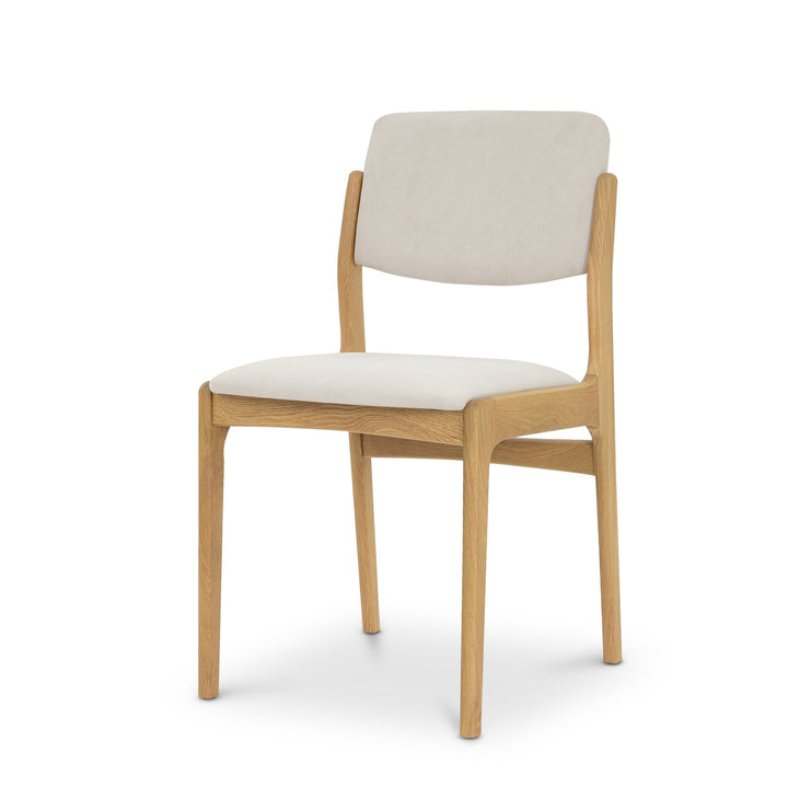 Oslo Dining Chair - Riley fabric with light natural oak frame, cushioned seat and backrest, minimalist Scandinavian design, gallery position 1.