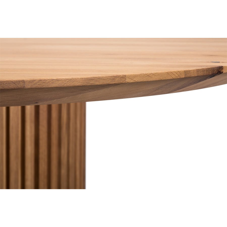 Oslo Round Dining Table - Real American Oak Wood close-up of smooth edge and slatted base in minimalist solid oak Scandinavian design, gallery 1