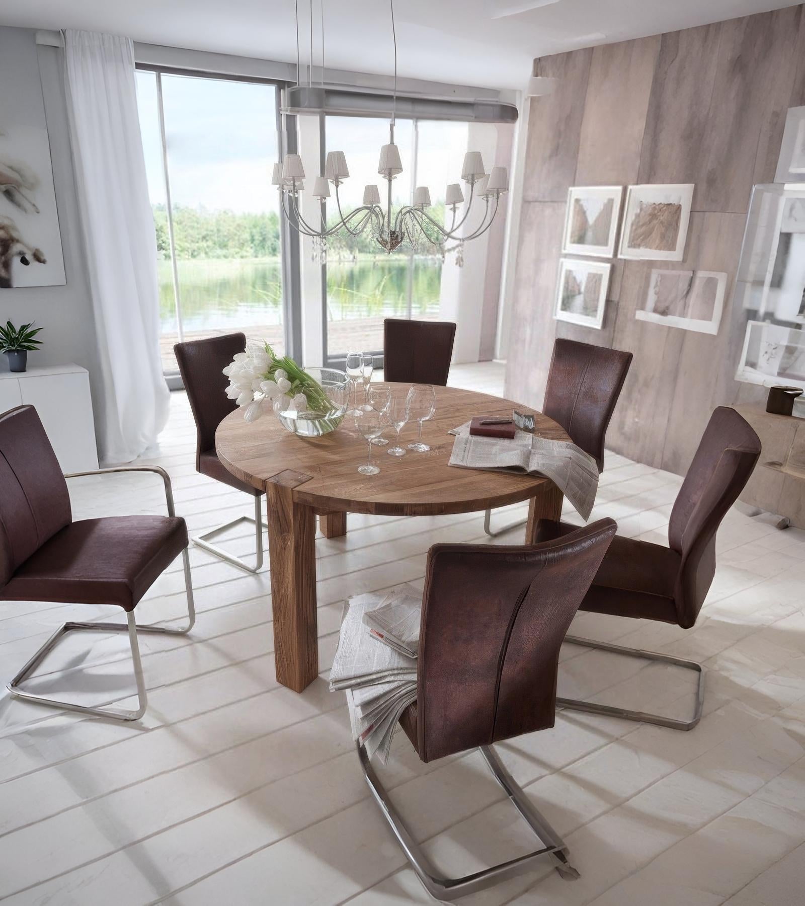 Rooma round solid oak dining table with natural oil-wax finish and handcrafted design