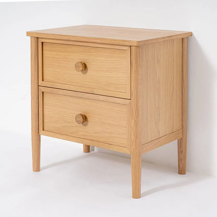 Wooden nightstand with two drawers on a white background