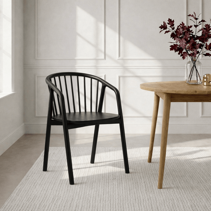 Saga – Classic Espresso Finished Oak Dining Chair with sculpted spindle back and rounded frame in minimalist setting, gallery position 1.