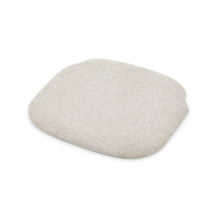 Saga Cobble seat pad detail, beige woven fabric texture, American white oak chair