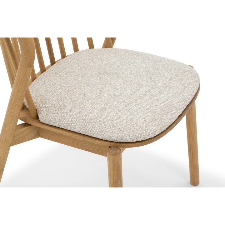Saga American White Oak dining chair, close-up of Cobble seat pad and front legs