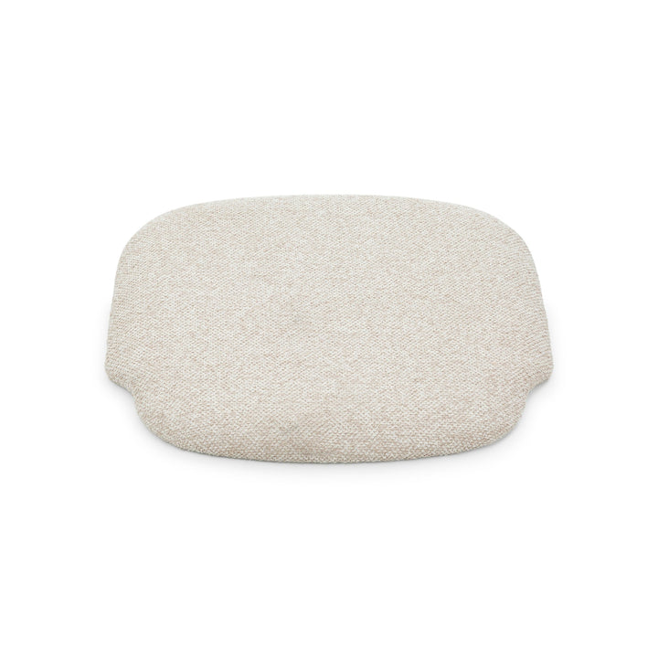 Saga Cobble seat pad close-up, textured beige fabric on American white oak chair