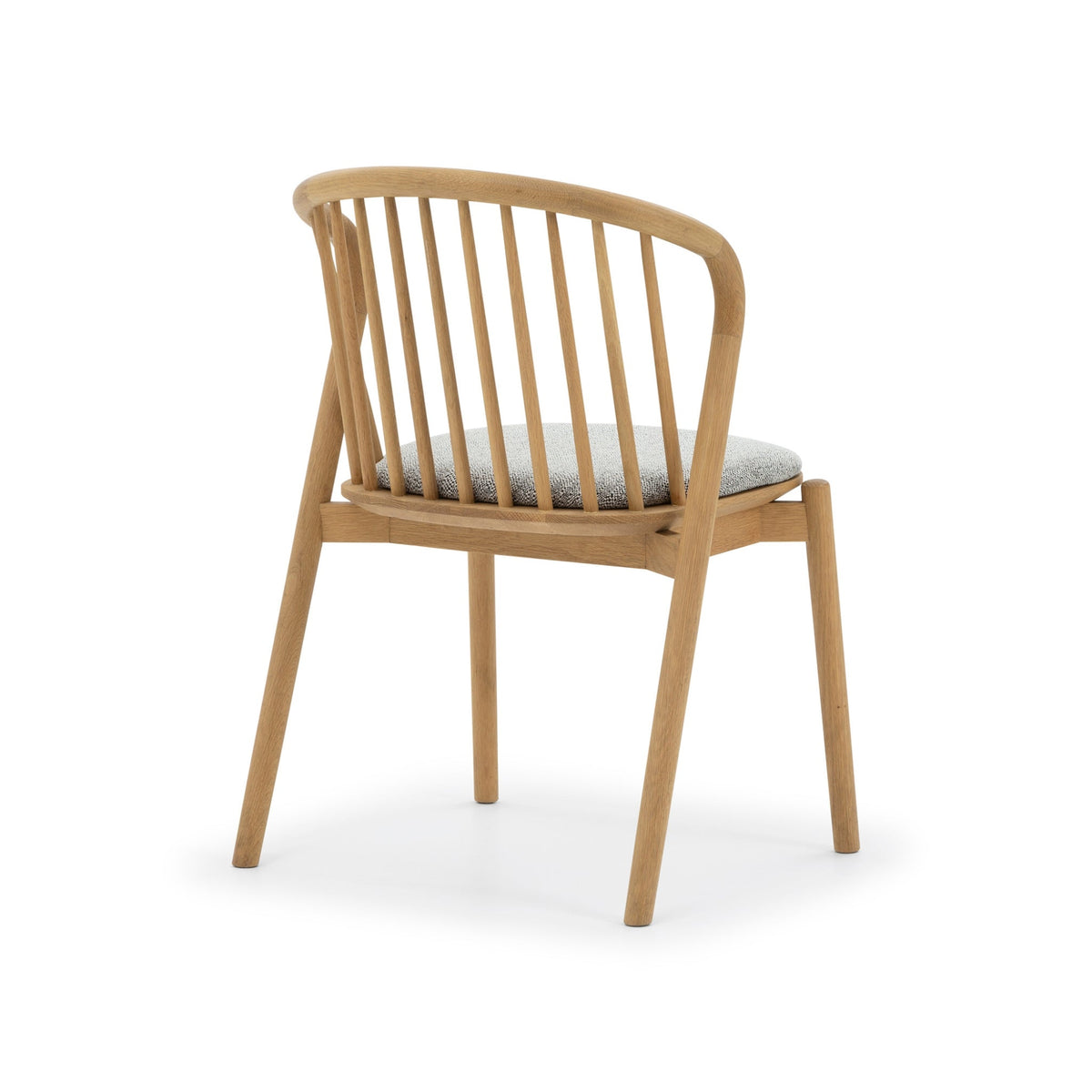 Saga American White Oak dining chair with Noel upholstered seat pad, rear three-quarter view