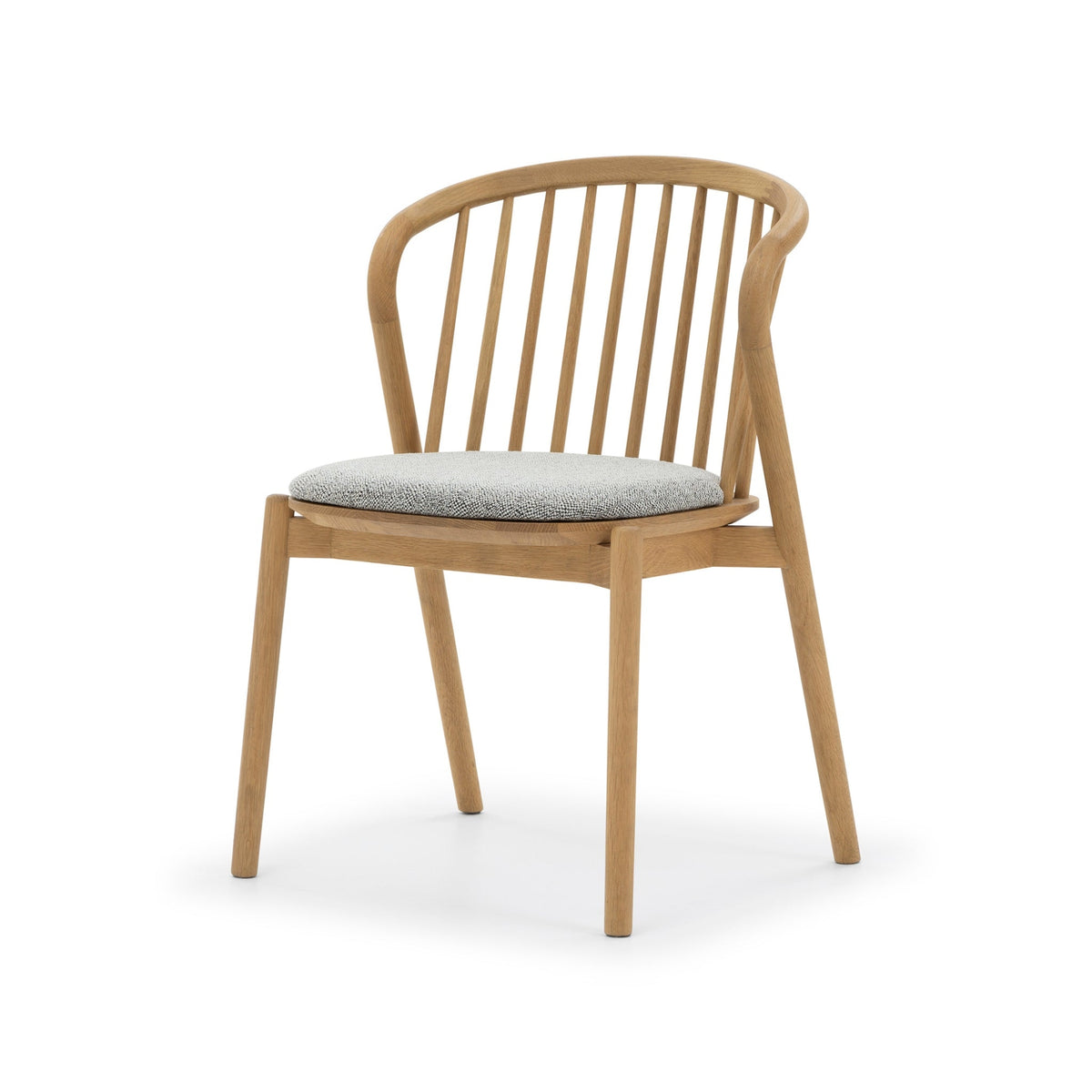 Saga American White Oak dining chair with Noel seat pad, spindle backrest, angled front view
