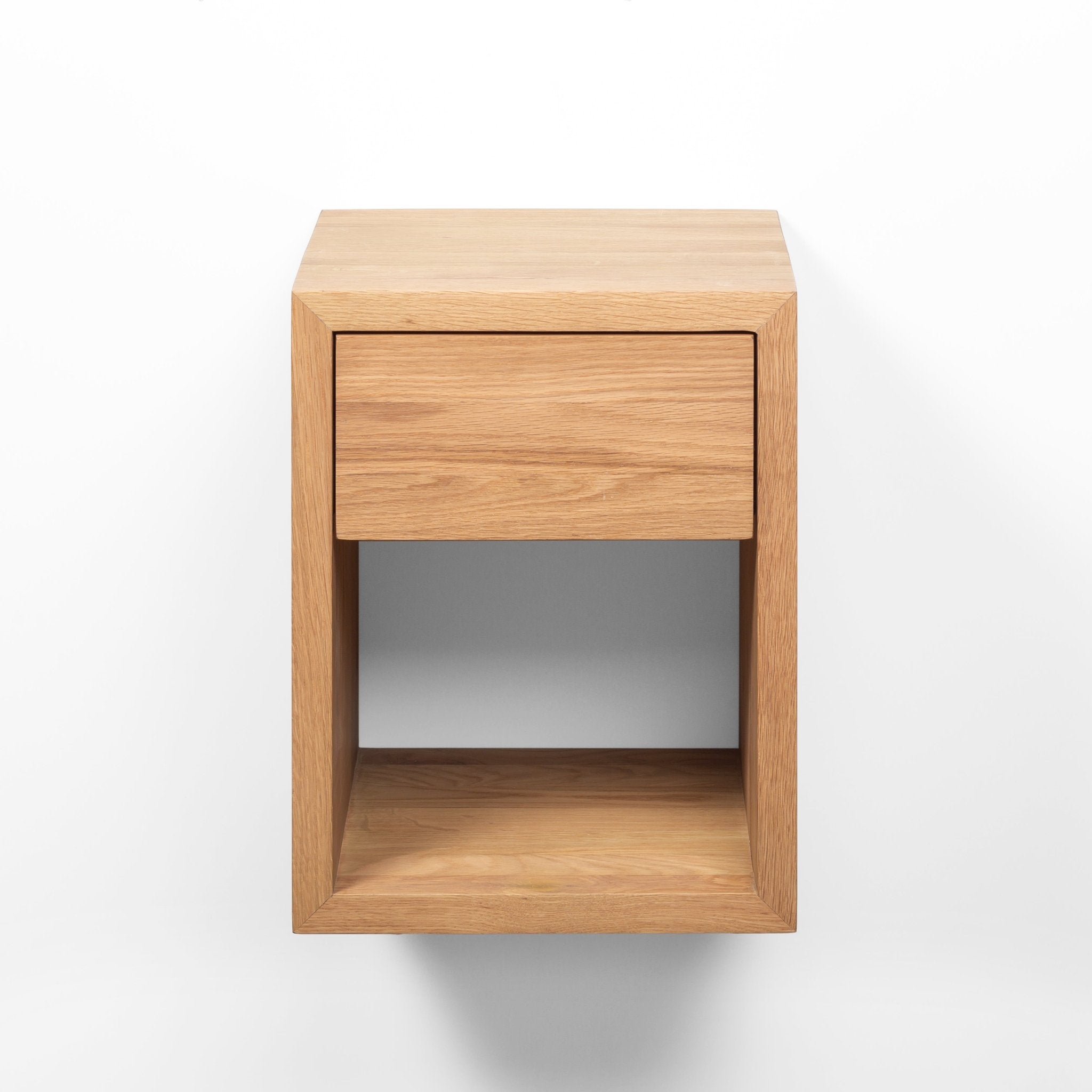 Hugo floating solid oak nightstand with open shelf, natural matte lacquer, front angle