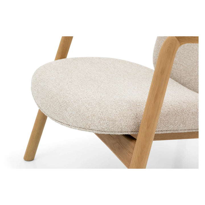 Theo Armchair – Cobble Fabric close-up on rounded seat cushion and smooth solid oak frame with natural textured upholstery, gallery position 1, Tugitool-Theo-Cobble-6.webp