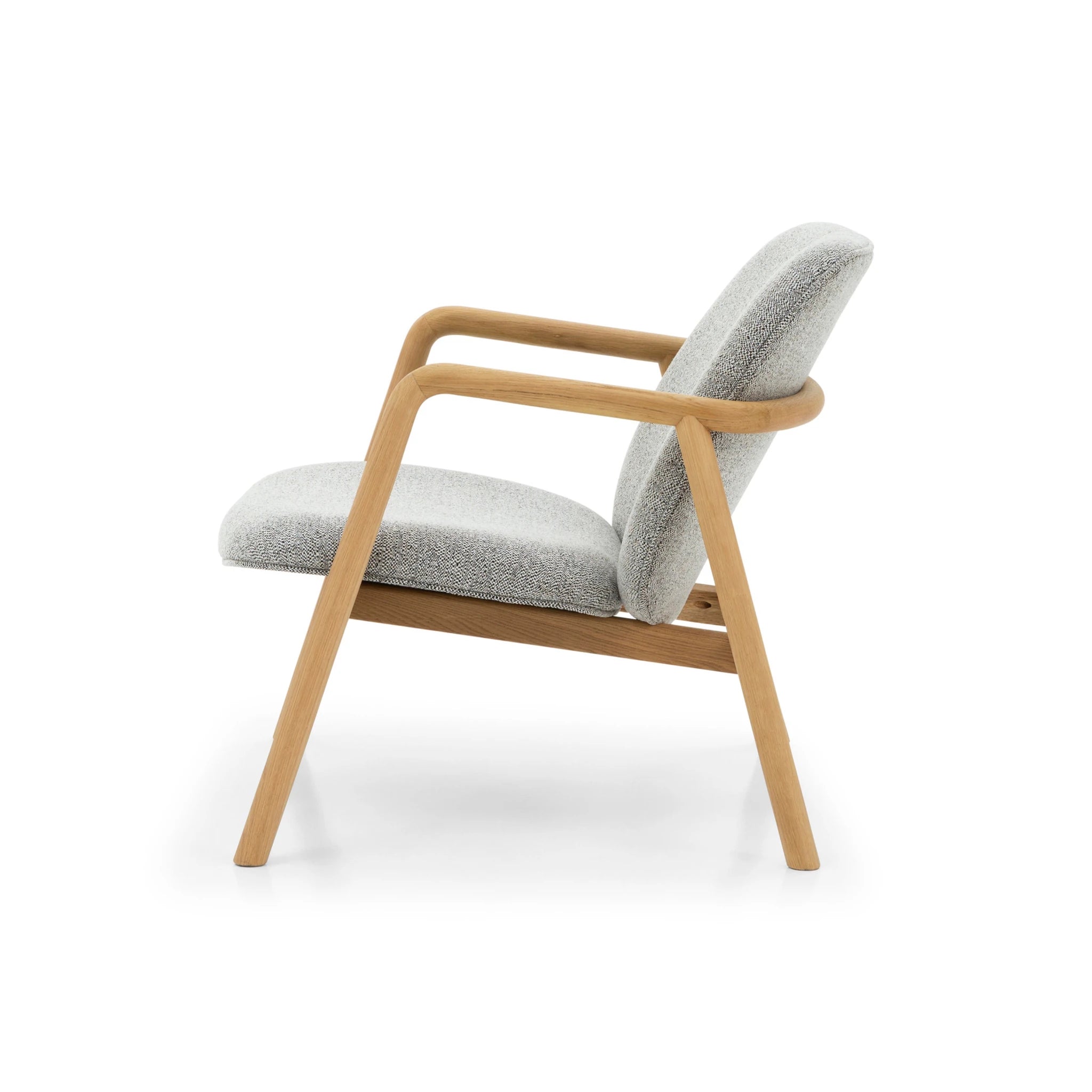 Theo Armchair – Noel Fabric side profile with smooth natural oak frame and softly curved armrest in light gray upholstery, gallery position 1.