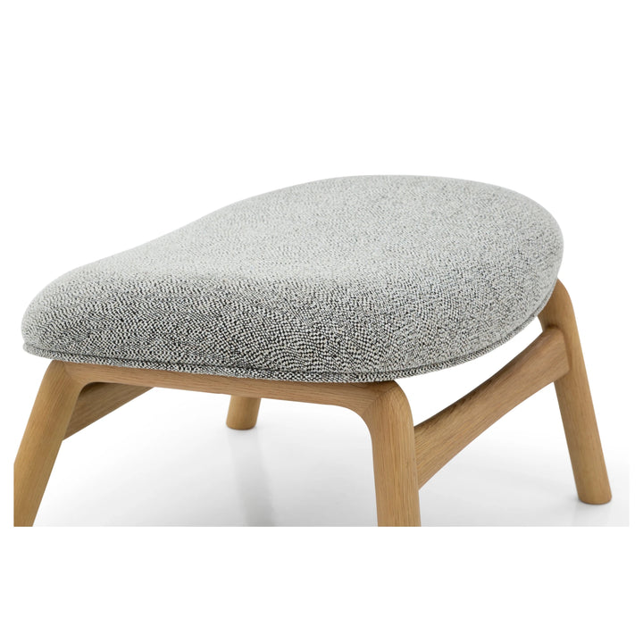 Theo Footstool – Noel Fabric close-up of curved natural oak frame and textured light gray cushion, gallery position 1, Jari-Theo-Noel-6.webp