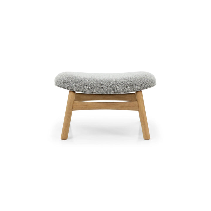 Modern oak footstool in Noel fabric with organic curved design