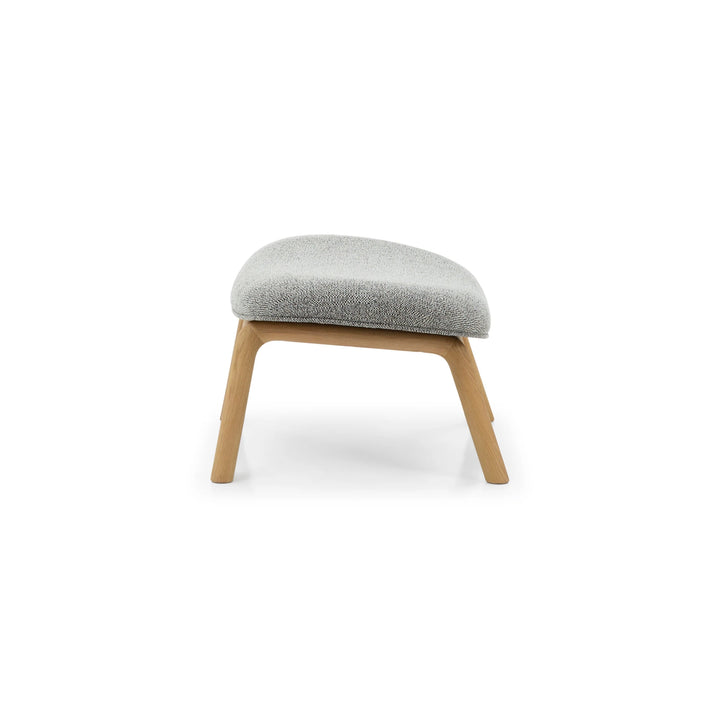 Theo Footstool – Noel Fabric side angle highlighting gently curved solid oak frame and light gray textured cushion, gallery position 1.