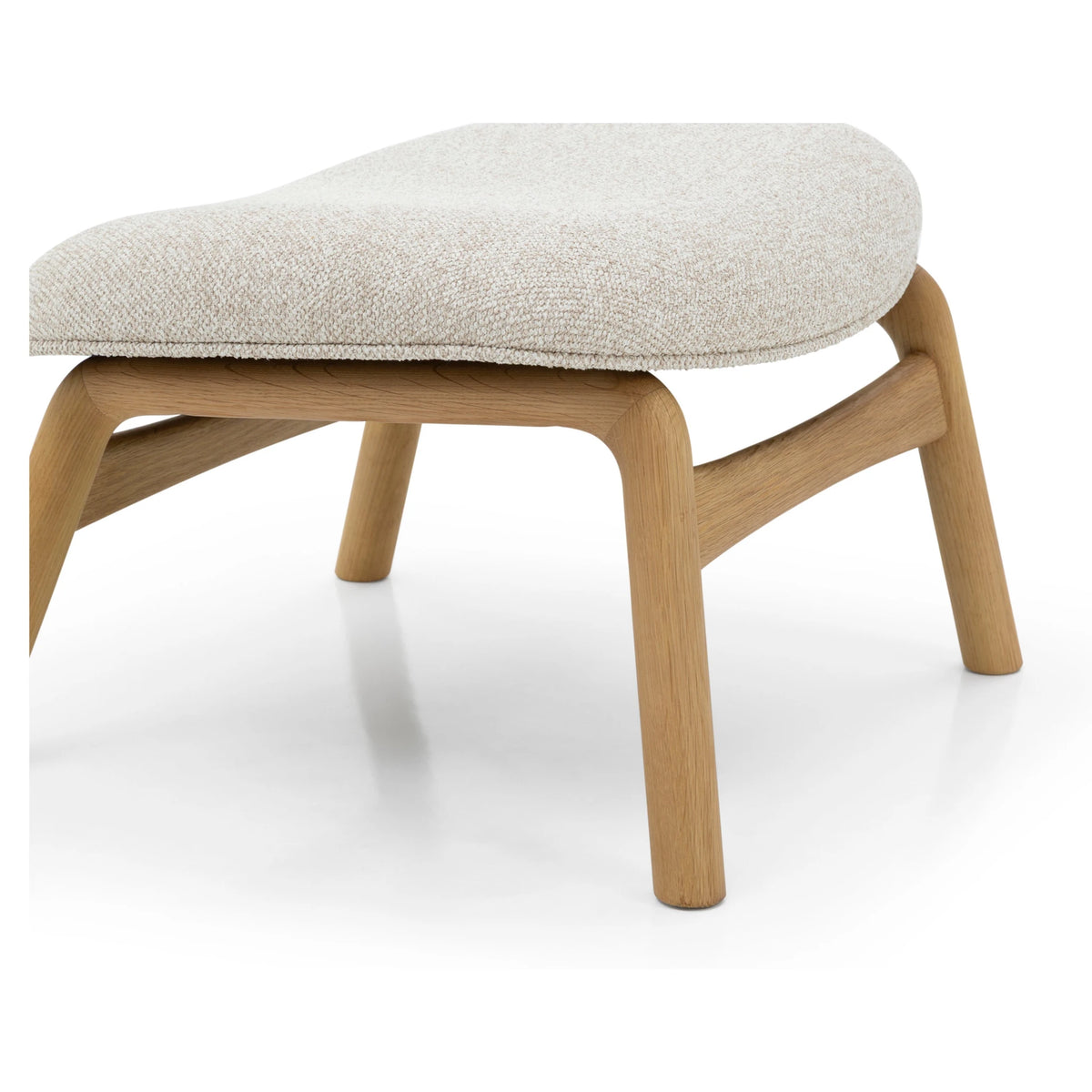 Theo Oak Footstool – Cobble Fabric side view highlighting gently curved solid oak legs and textured off-white cushion