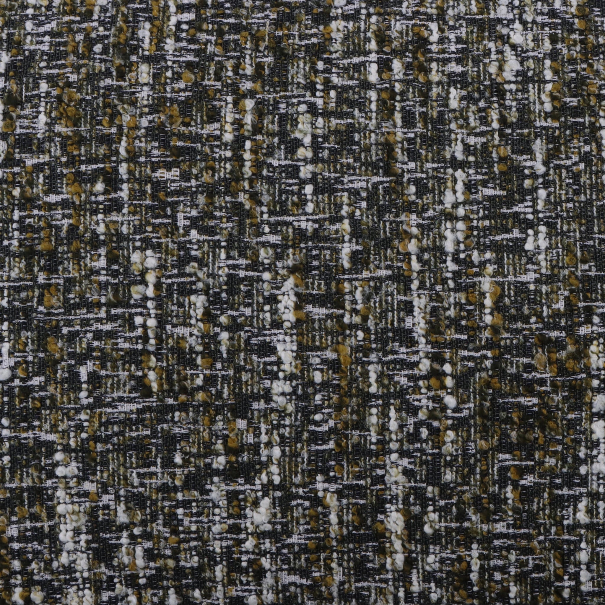 Theo Oak Pouf – Green Fabric close-up of textured woven upholstery with black, white, and mustard tones, gallery position 1, Ottoman_Tumba-Theo-Roheline-6.webp