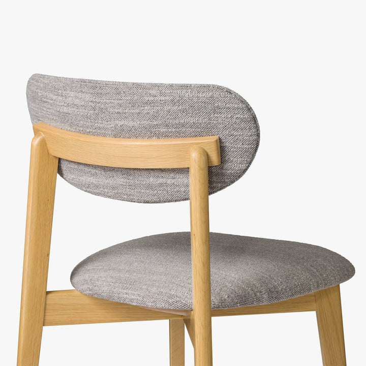 Theo American White Oak Dining Chair, Leigh Fabric - curved grey fabric backrest and natural oak frame, rear angle