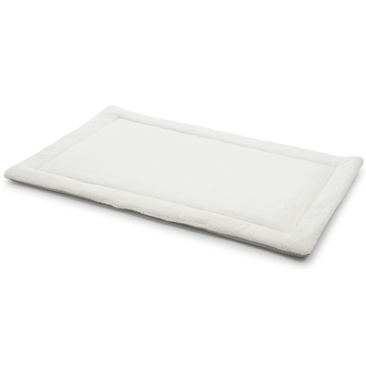White teddy dog mattress with reversible design and non-slip base for crate or sofa use