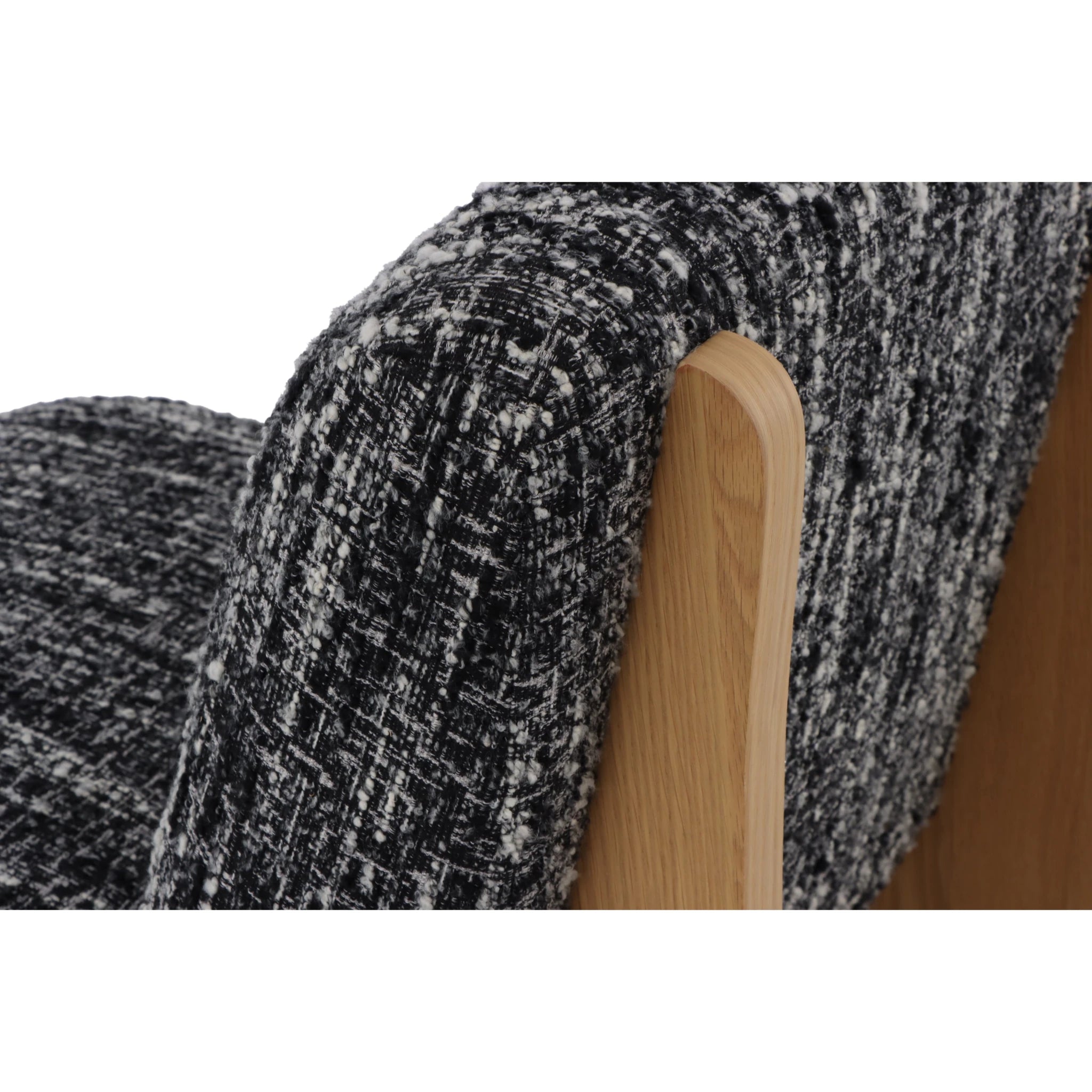 Tommy – Black Fabric Armchair with Oak Legs close-up of textured black-and-white fabric and smooth natural oak frame, gallery position 1