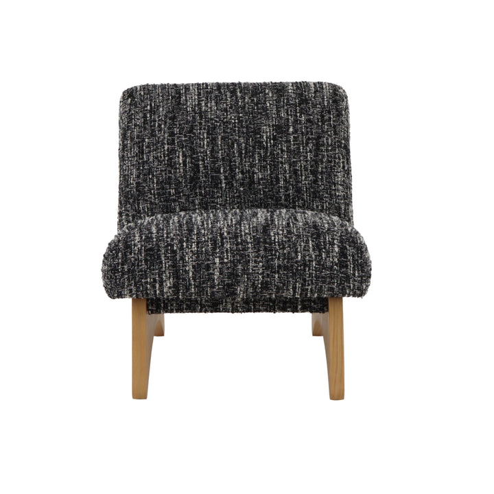 Modern black-and-white fabric armchair with oak wood base and matte finish