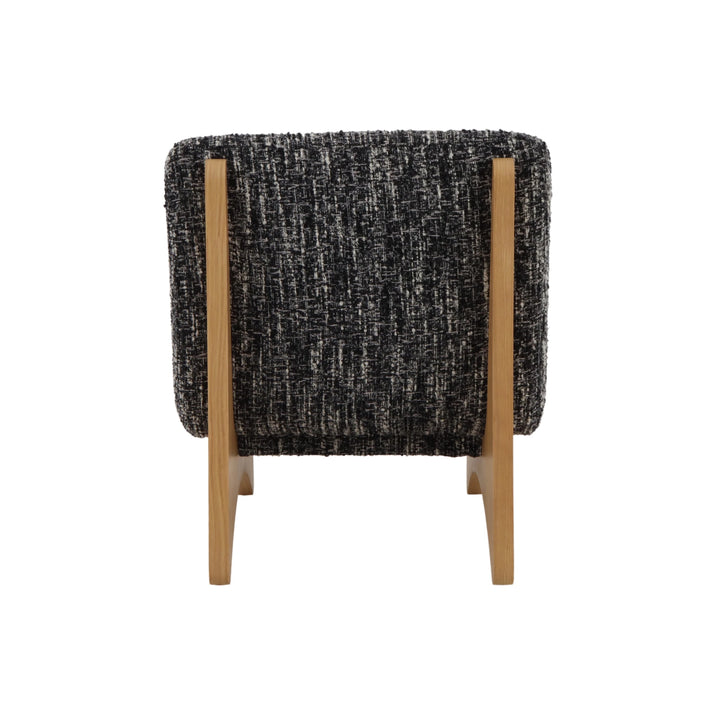 Tommy – Black Fabric Armchair with Oak Legs rear view highlighting textured black-and-white fabric and solid natural oak frame