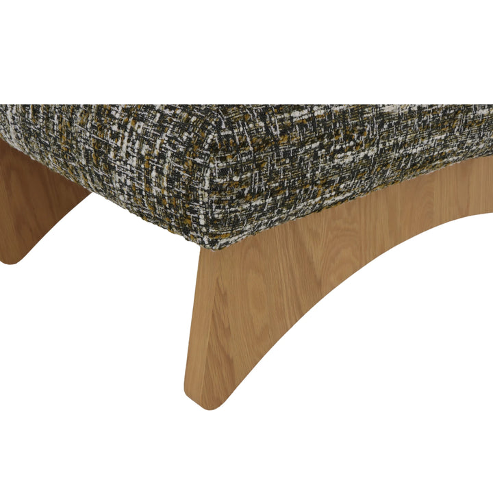 Tommy – Green Fabric Armchair with Oak Legs close-up on curved natural oak base and textured green upholstery corner