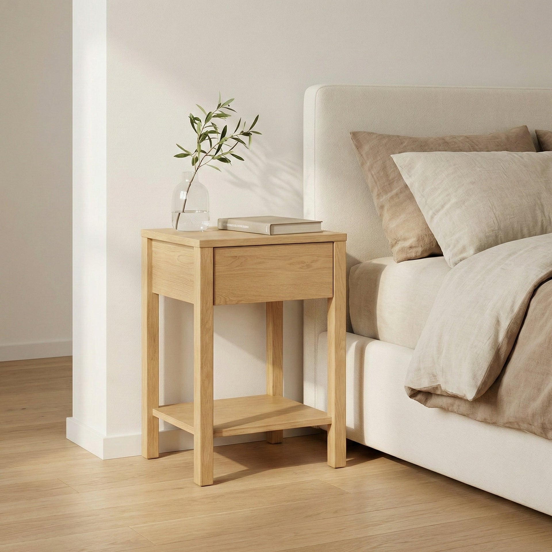 Tommy Nightstand with Drawer – Solid American Oak next to bed in minimalist bedroom with neutral bedding and wooden floor
