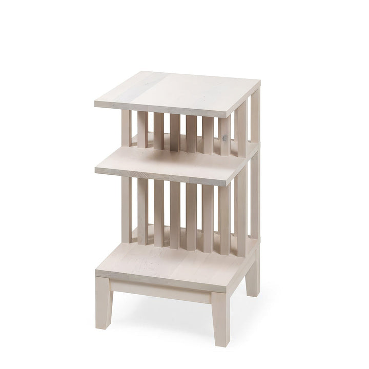 Modern white bedside table made from solid beech with three open storage levels