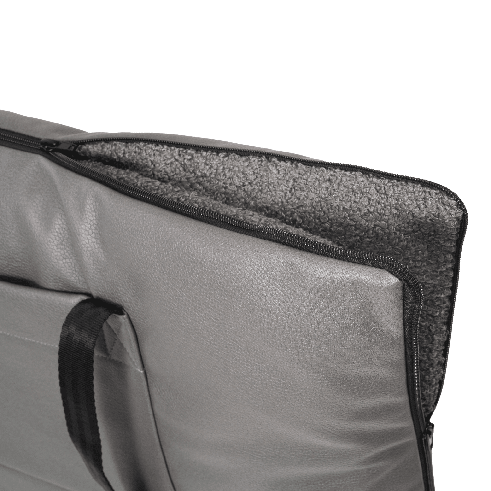 A close-up of the Woodek 2-in-1 Dog Travel Bag & Mattress in grey, featuring a black handle, a soft textured inner lining, and a zippered design, shown partially open against a white background.