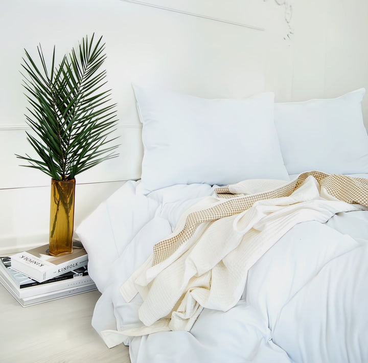 UltraClean duck down and feather summer comforter with white edging and golden stitching