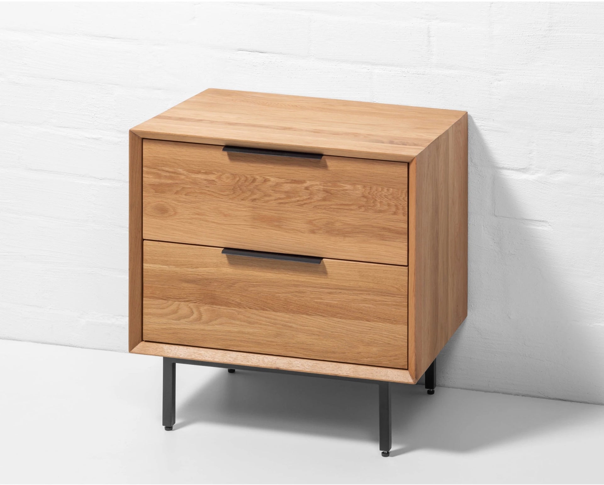 Modern oak veneer bedside table with solid oak frame and minimalist design