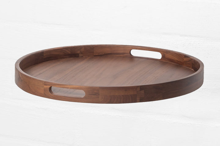Wooden Serving Table Hugo - Walnut round tray with integrated handles and smooth walnut grain, minimalist solid wood design